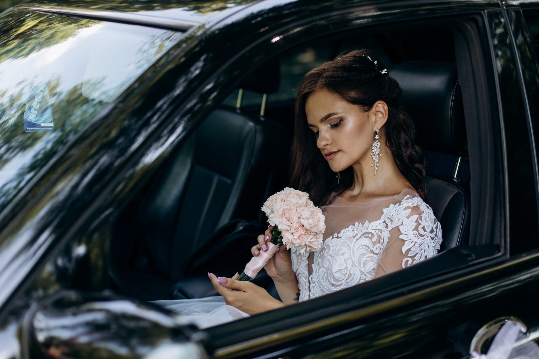 Bride in car