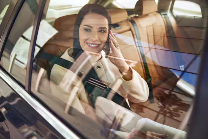 Woman in car on phone